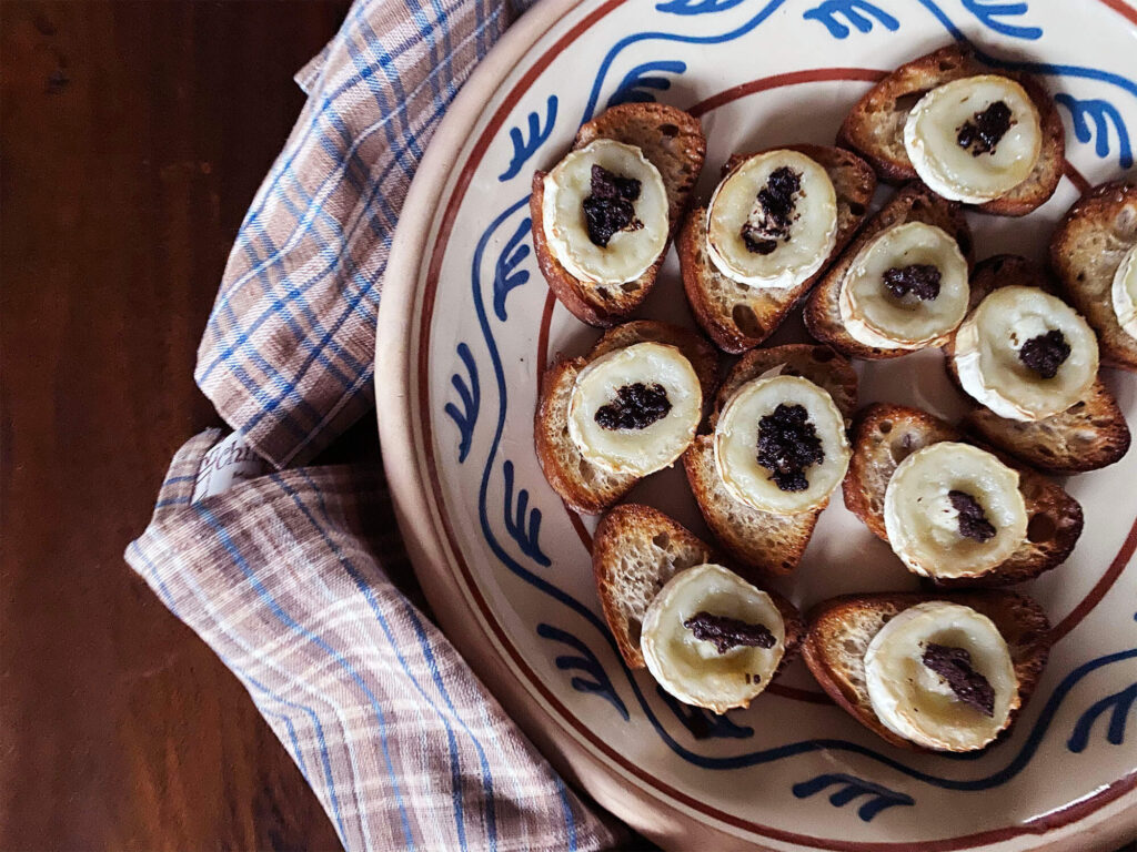 Recipe: Warm Goat Cheese Toasts with Olive Tapenade